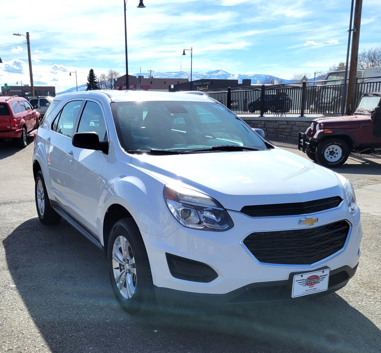 2017 White /Black Chevrolet Equinox LS 2WD (2GNALAEK3H1) with an 2.4L L4 DOHC 16V FFV engine, 6A transmission, located at 450 N Russell, Missoula, MT, 59801, (406) 543-6600, 46.874496, -114.017433 - Nice Front Wheel Drive SUV. 2.4L I4 Engine. 6 Speed Automatic Transmission. Bluetooth. Backup Camera. Air. Cruise. Tilt. Power Windows and Locks. - Photo #5